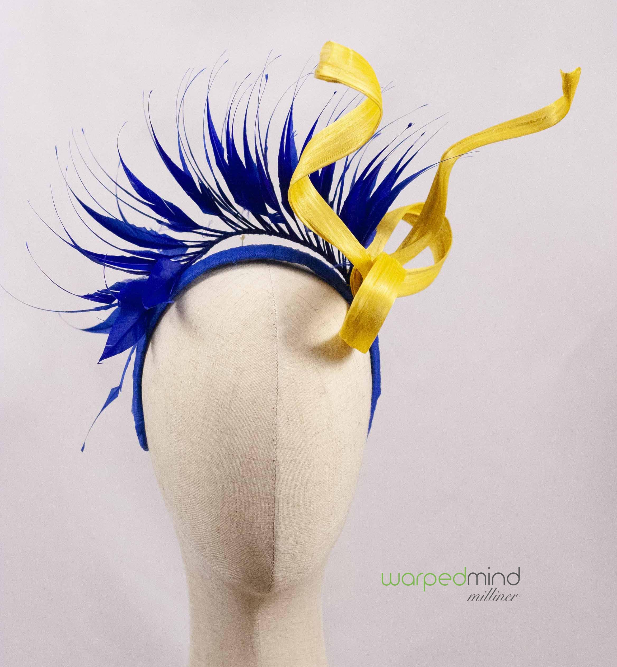 Yellow bow and royal blue fascinator